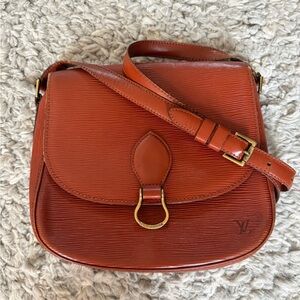 Louis Vuitton Cartouchière MM in Epi Leather.